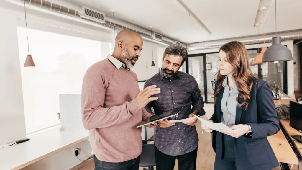 Customer service managers discussing how to strengthen connections with customers