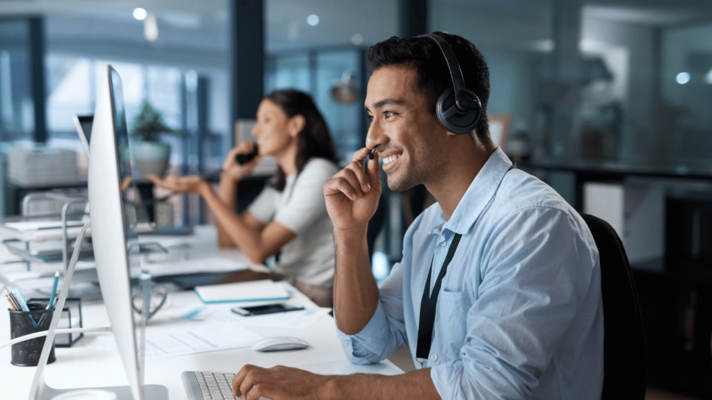 Customer success teams in a meeting discussing customer success software options