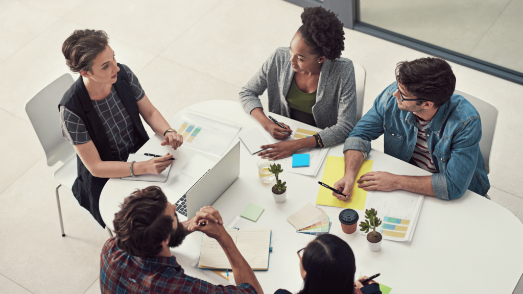 Customer support team brainstorming together to improve agent performance