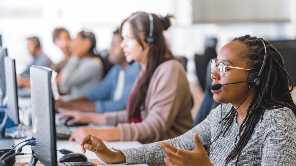 Customer service reps busy working on good customer service