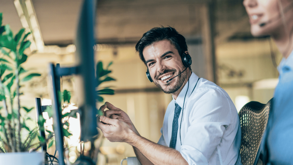 Customer support agent interviewing a customer for a review request