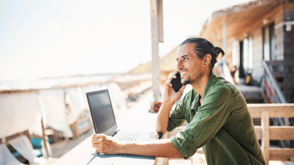 Digital nomads having a meeting while at a beach